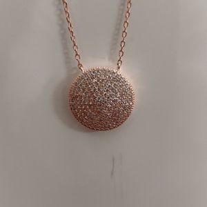 Rose gold and CZ round pendant